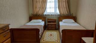 Гостиница Тархо Отель Махачкала Двухкомнатный номер с 2 отдельными кроватями-13